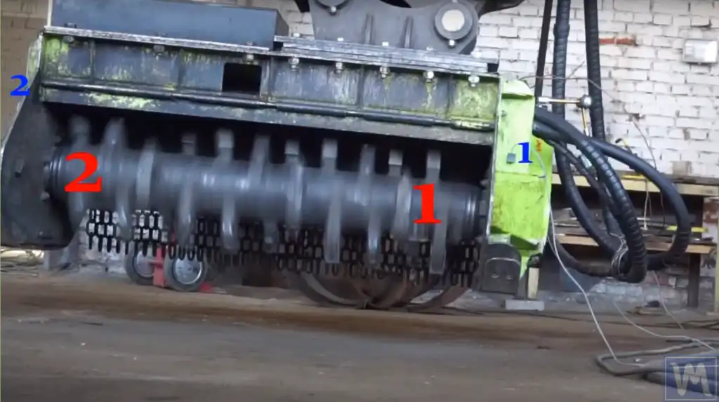 Mulcher rotor showing sensor positions (blue 1 and 2) and correction planes (red 1 and 2)