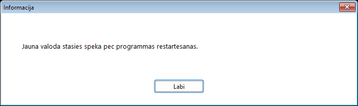 The bilingual notice that appears after selecting a new interface language, stating that the change takes effect after a restart